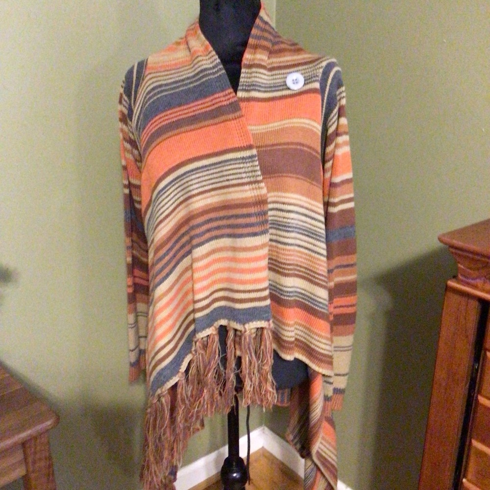 Beautiful multicolor sweater. Bought online. Does not have a brand